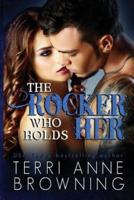 The Rocker Who Holds Her