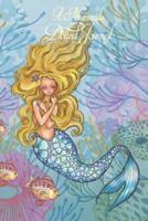 A Mermaids Dotted Journal