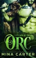 Captured by the Orc: A Monster Romance