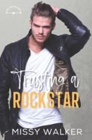 Trusting a Rockstar: A rockstar workplace romance