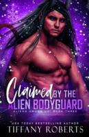 Claimed by the Alien Bodyguard: A SciFi Alien Holiday Romance