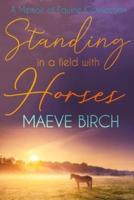Standing in a Field With Horses