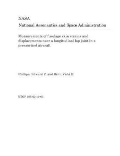 Measurements of Fuselage Skin Strains and Displacements Near a Longitudinal Lap Joint in a Pressurized Aircraft