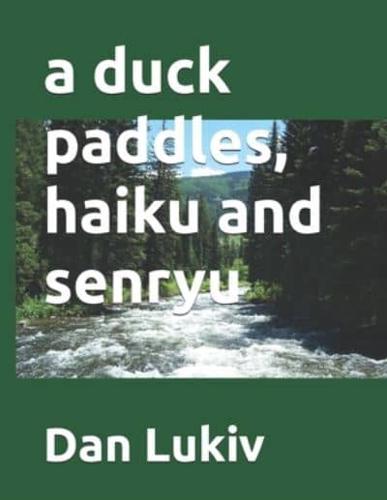 a duck paddles, haiku and senryu